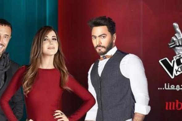 بالفيديو- تامر حسني يناكف نانسي عجرم في كواليس The Voice Kids