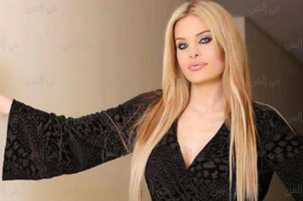 بالصور -  دومينيك حوراني ترد على شائعة نفخ شفاها: ماما اسمها جميلة